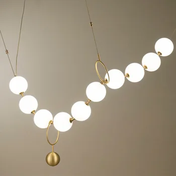  Скандинавское постмодернистское роскошное дизайнерское креативное Жемчужное ожерелье с подвесной лампой на фоне прикроватной тумбочки Magic Bean Lamp
